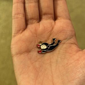 Rare roller rabbit charm